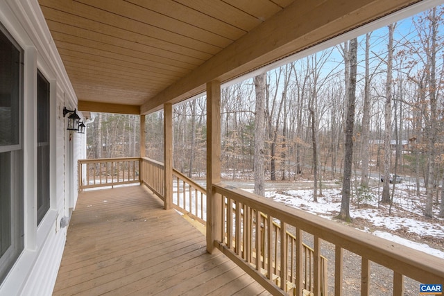 view of snow covered deck