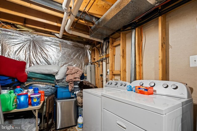 washroom with washing machine and dryer