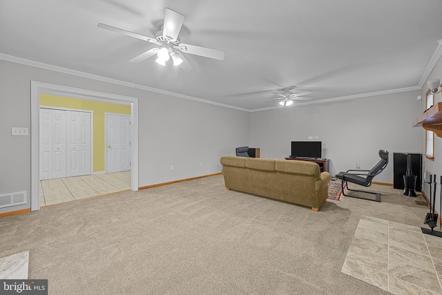 living room with ornamental molding, ceiling fan, and light colored carpet