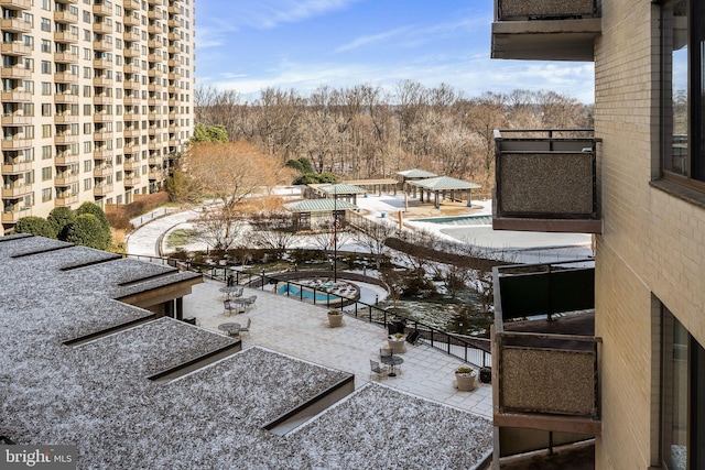 view of snow covered pool