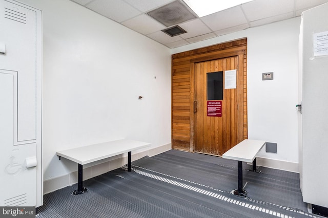 miscellaneous room with a drop ceiling