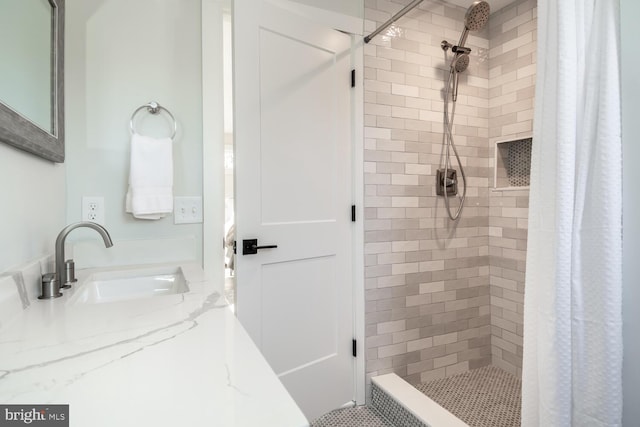 bathroom featuring sink and walk in shower