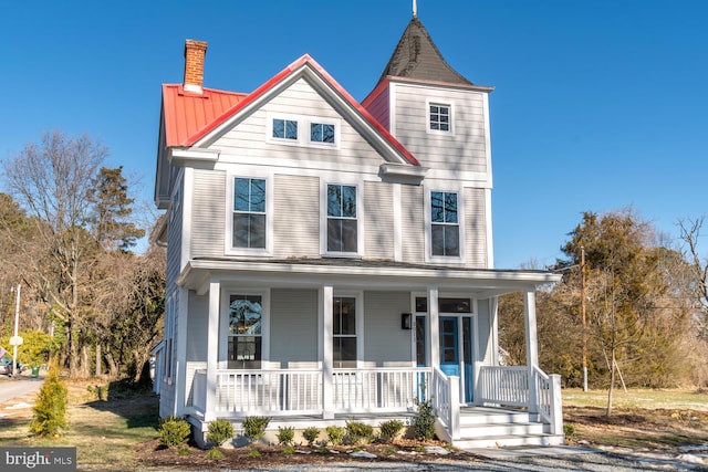 view of front facade featuring covered porch