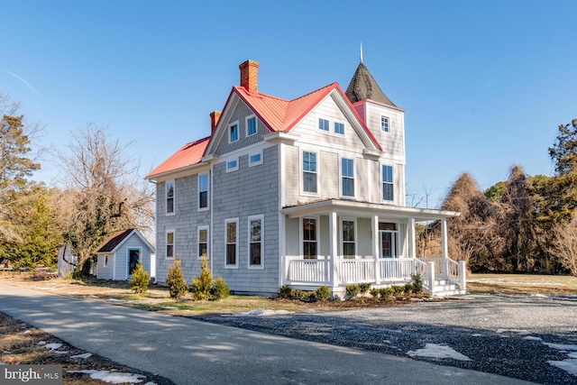 victorian-style house with covered porch