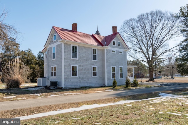 view of front of home with cooling unit