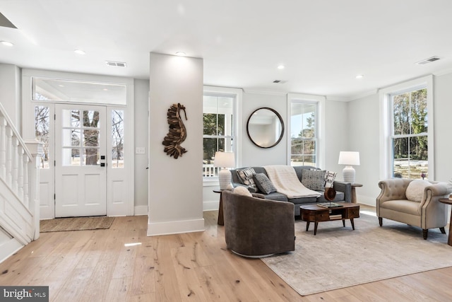 living room with light hardwood / wood-style floors