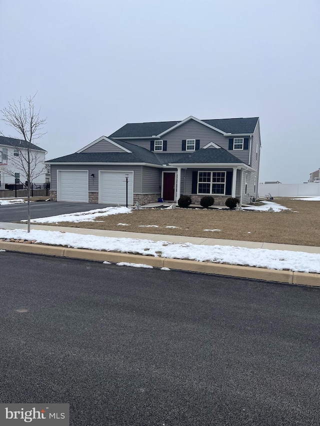 view of front of home with a garage