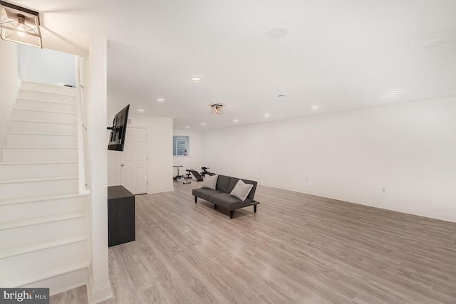 living room with light hardwood / wood-style flooring