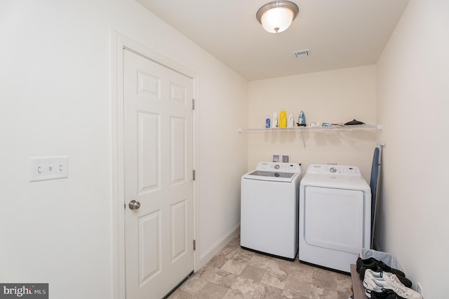 laundry area featuring independent washer and dryer