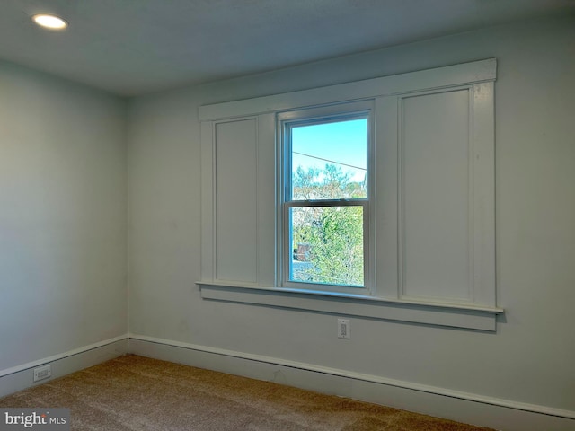 empty room featuring carpet floors