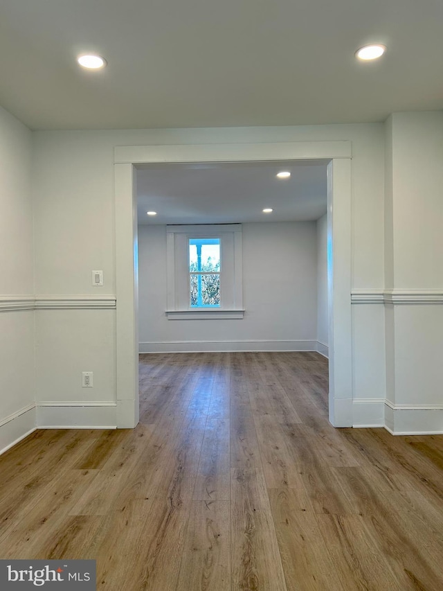 spare room featuring light hardwood / wood-style flooring