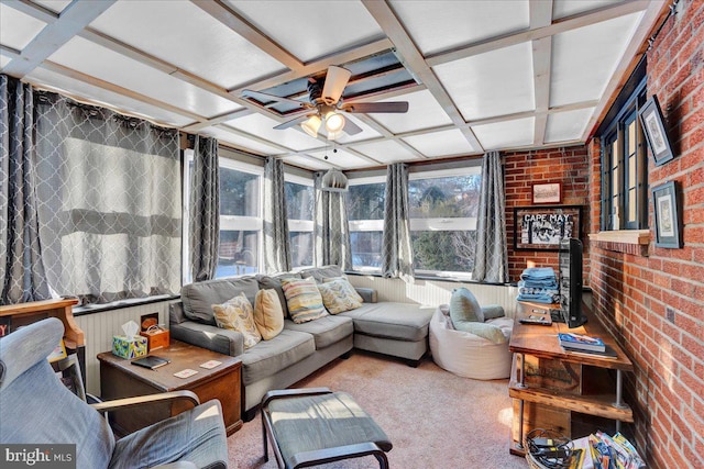 sunroom featuring ceiling fan and coffered ceiling