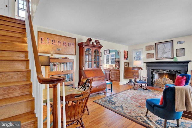 sitting room with hardwood / wood-style floors