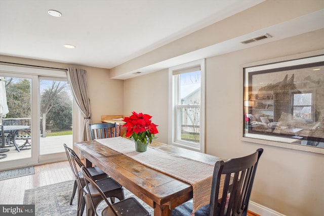 dining room featuring wood-type flooring