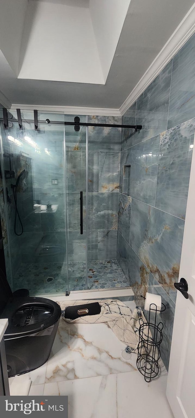 bathroom featuring crown molding, vanity, and an enclosed shower