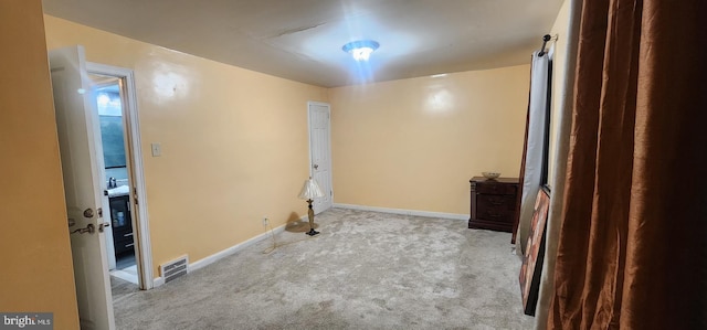 basement with light colored carpet