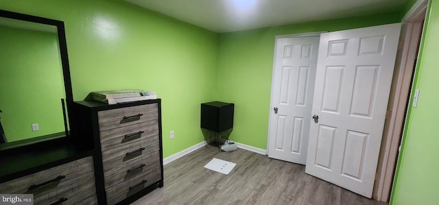 bedroom featuring light hardwood / wood-style flooring