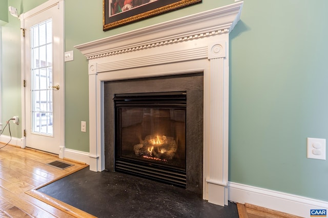 room details featuring hardwood / wood-style flooring