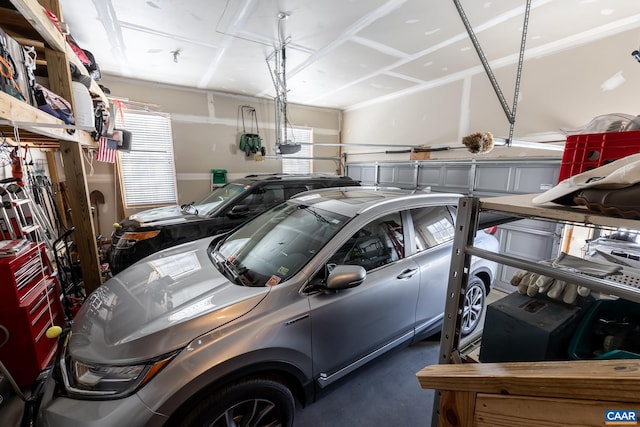 garage featuring a garage door opener