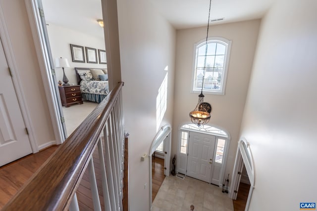 entryway featuring an inviting chandelier