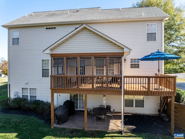 back of house with a patio area