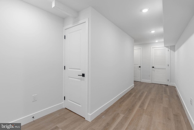 corridor featuring light wood-type flooring