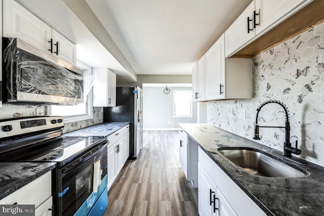 kitchen with sink, white cabinetry, and appliances with stainless steel finishes