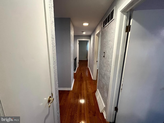 hall featuring dark hardwood / wood-style floors