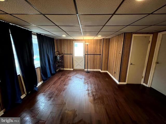 unfurnished room with dark hardwood / wood-style floors