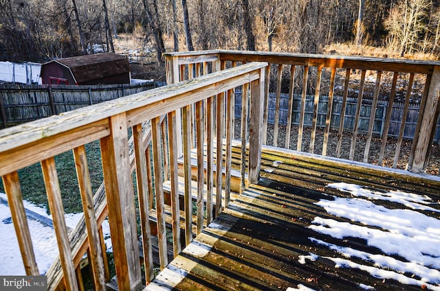 view of snow covered deck