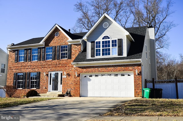 colonial-style house featuring a garage