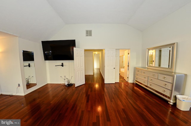 bedroom featuring vaulted ceiling and dark hardwood / wood-style floors