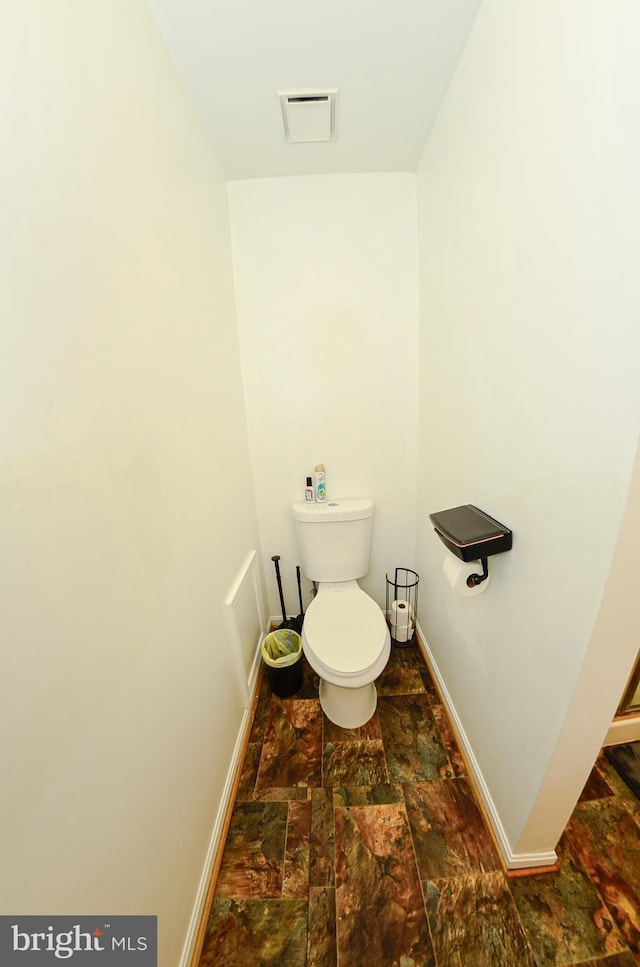 bathroom featuring toilet