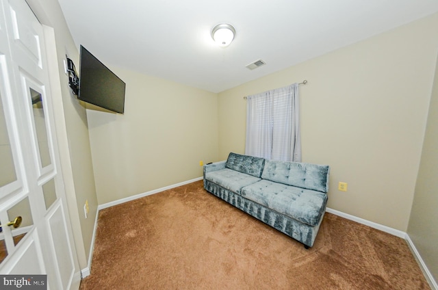 living area with carpet flooring