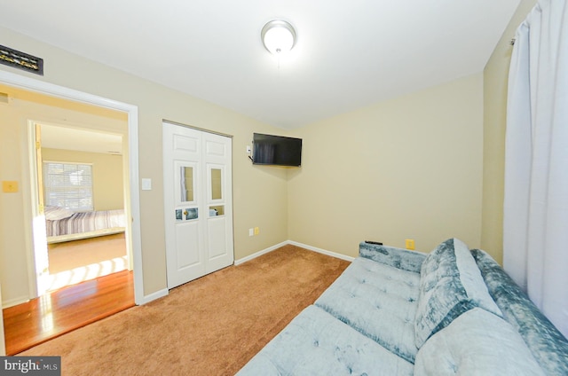 sitting room featuring carpet