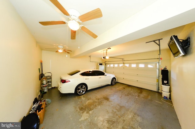 garage with a garage door opener and water heater