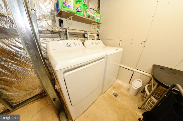 washroom with washer and clothes dryer