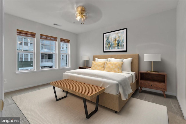 carpeted bedroom featuring ceiling fan