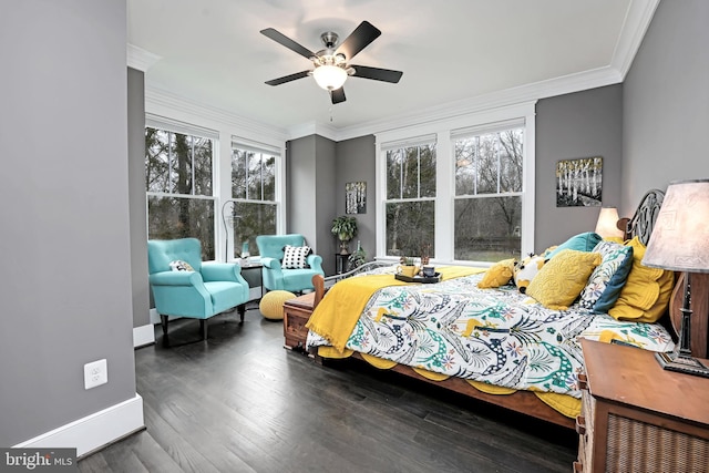 bedroom featuring crown molding, ceiling fan, and dark hardwood / wood-style flooring