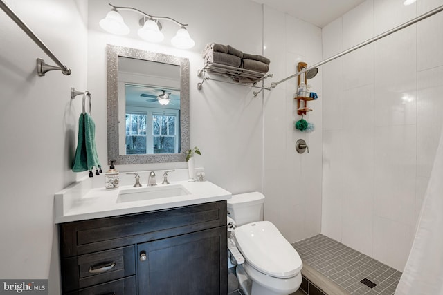 bathroom with vanity, curtained shower, and toilet