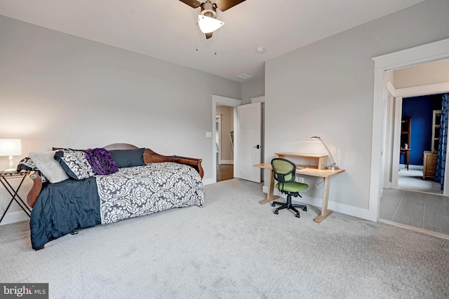 bedroom featuring ceiling fan and carpet flooring