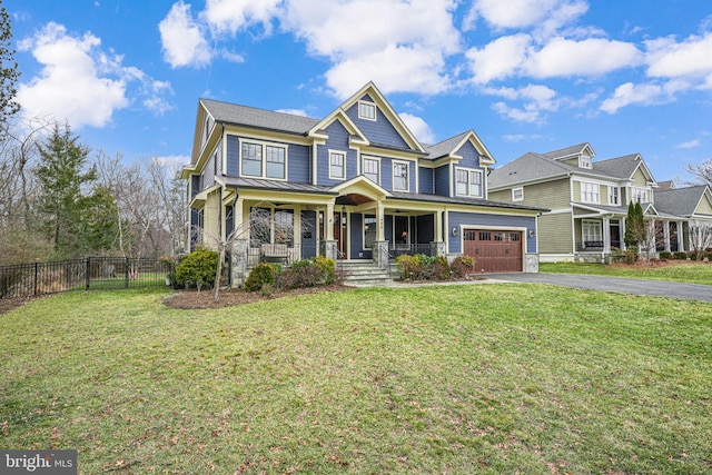 view of front of property featuring a front lawn and covered porch