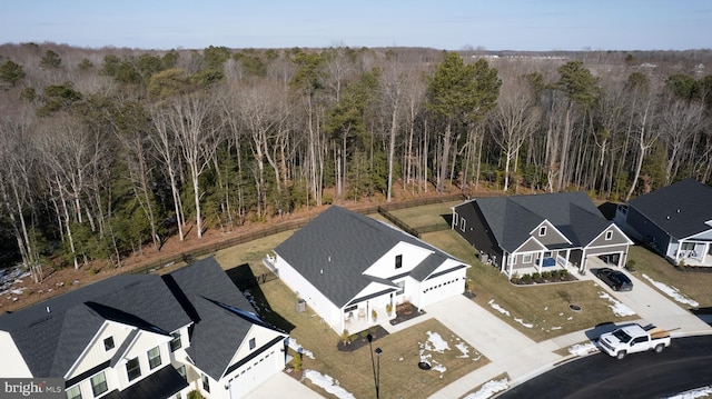 drone / aerial view with a forest view