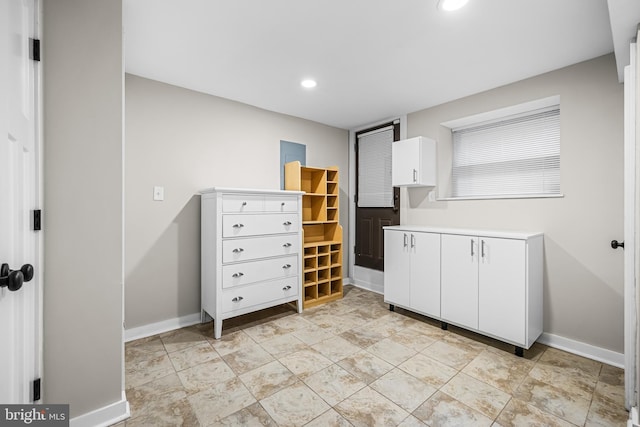 kitchen featuring white cabinetry