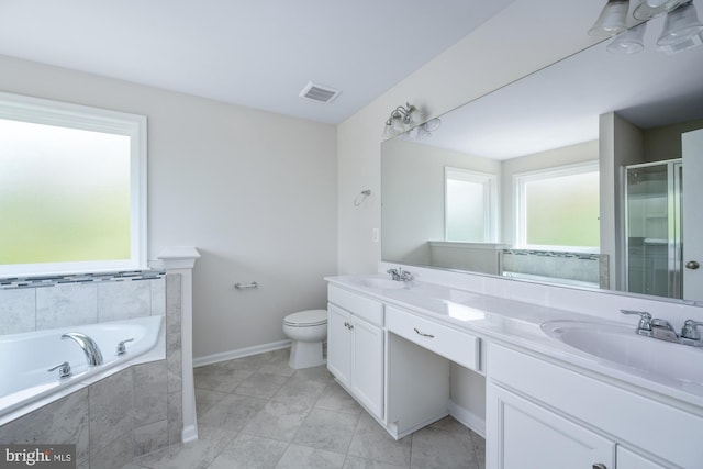 full bathroom with vanity, toilet, and independent shower and bath