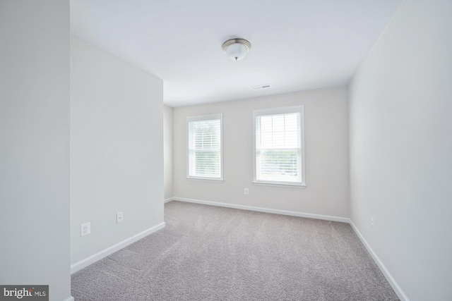 view of carpeted spare room