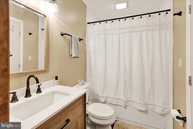 full bathroom featuring toilet, vanity, and shower / bath combo