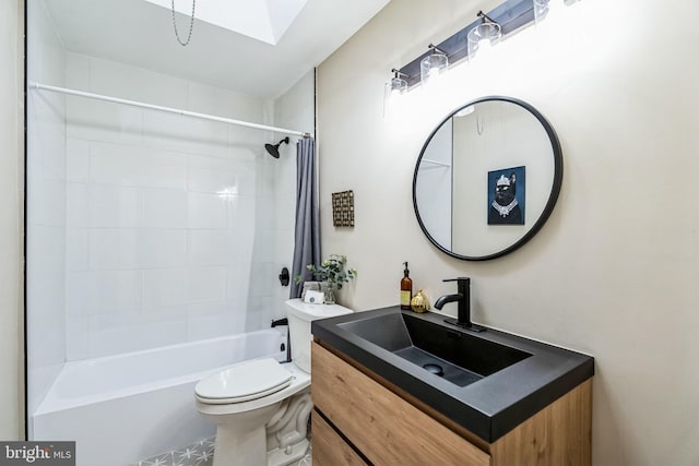 full bathroom with toilet, vanity, a skylight, and shower / bath combination with curtain