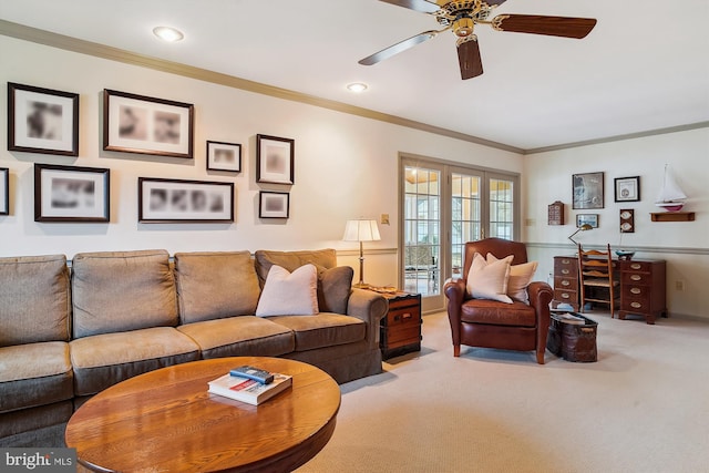 carpeted living room featuring crown molding and ceiling fan