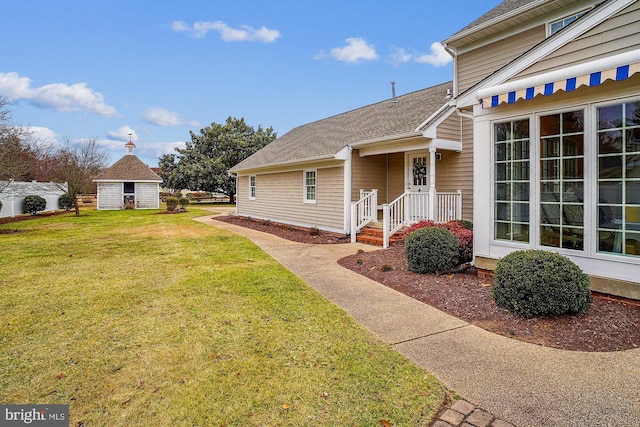 view of home's exterior featuring a lawn